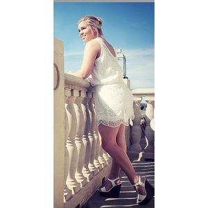 Lace romper delicate white bridal rehearsal dinner